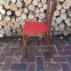 Vintage bistro chair sitting red