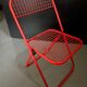 Chaise pliante en métal rouge