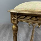 Antique gilded wooden bench in Louis XVI style, 19th century.