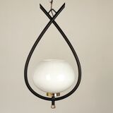 Metal and opaline suspension