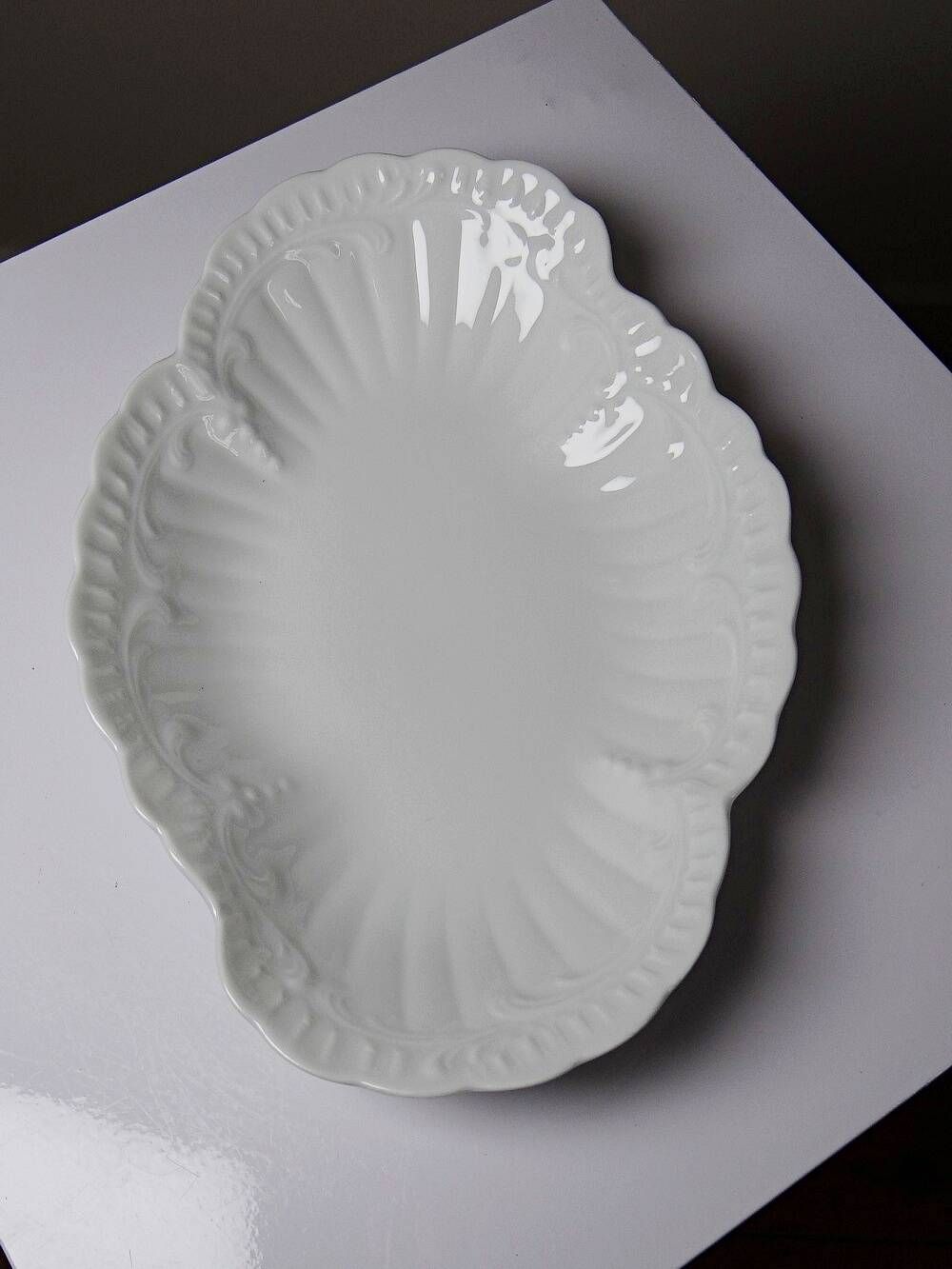 Vintage duo of Chastagner Limoges serving dishes, white rocaille porcelain.