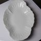 Vintage duo of Chastagner Limoges serving dishes, white rocaille porcelain.
