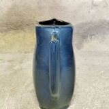 Blue glazed ceramic pitcher