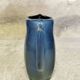 Blue glazed ceramic pitcher