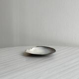 Mother-of-pearl pocket emptier