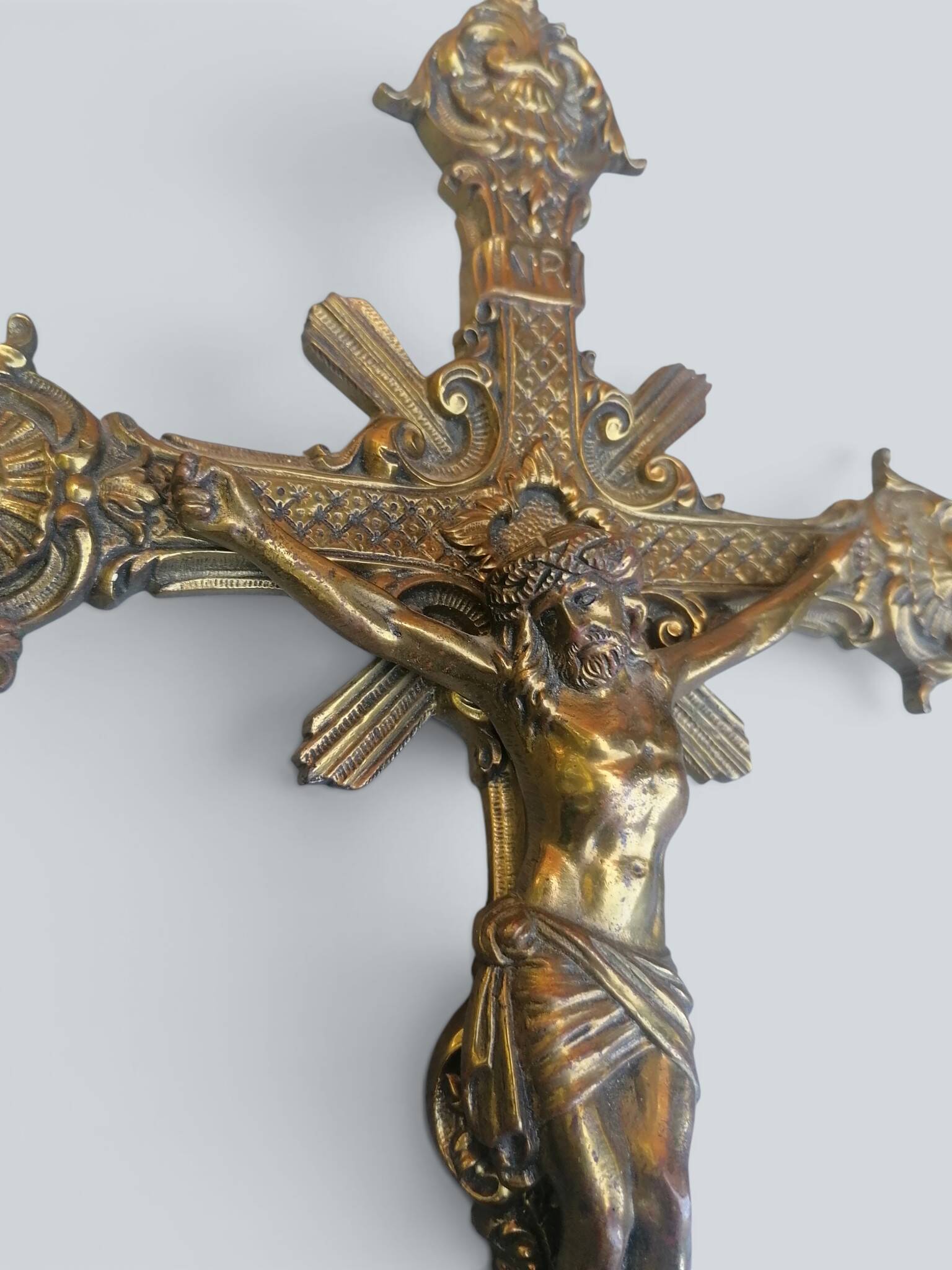 Ornate engraved brass crucifix, Christian cross, Jesus Christ.