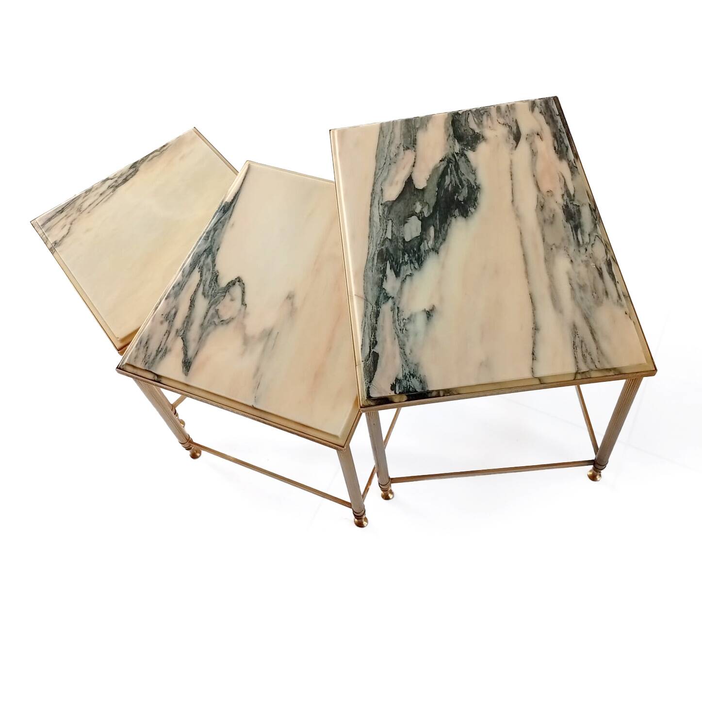Nested tables in brass and marble.
