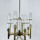Lustre à huit bras en laiton et tube de verre. Italie des années 1960, Sciolari