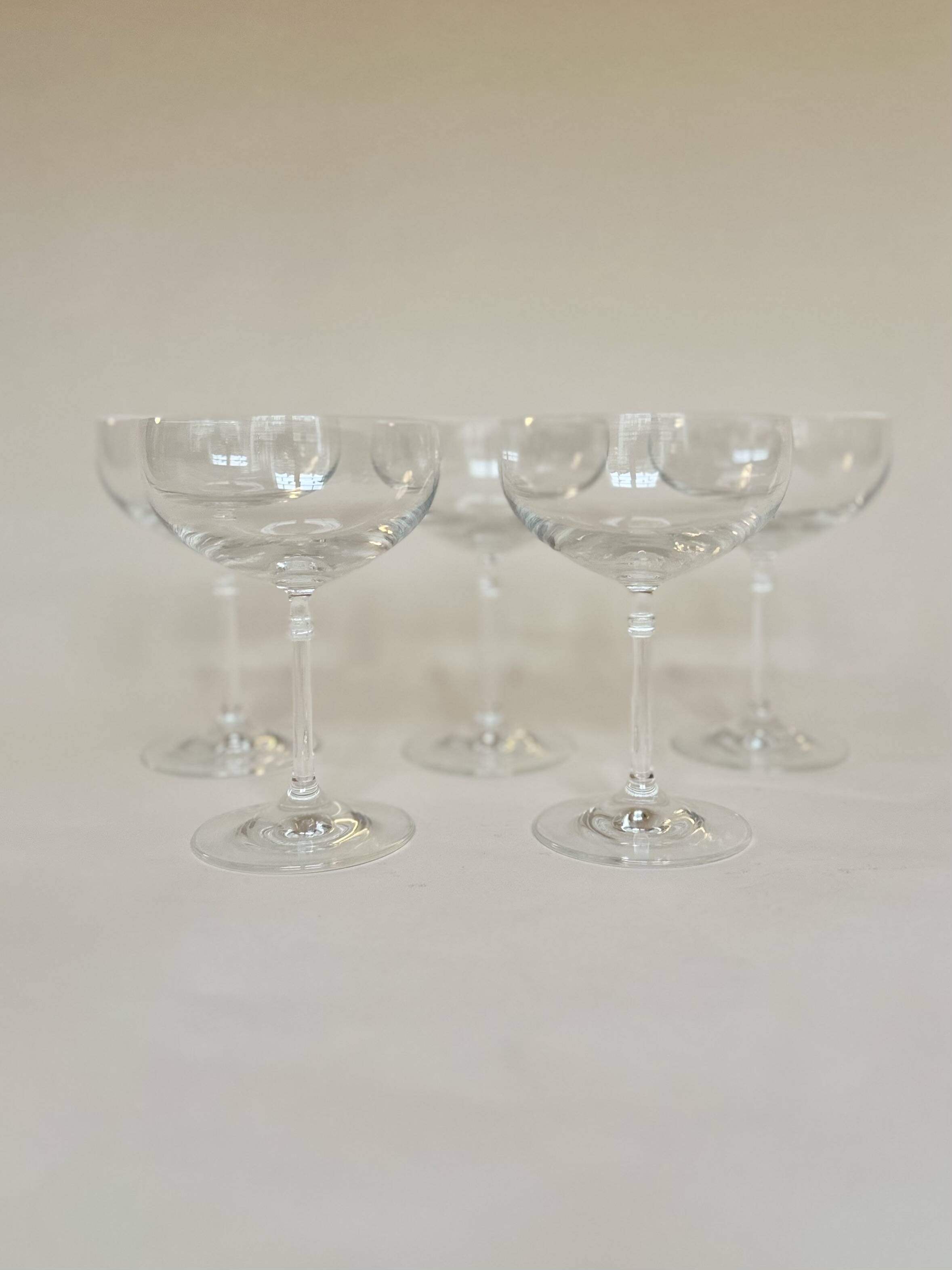 Set of five champagne glasses