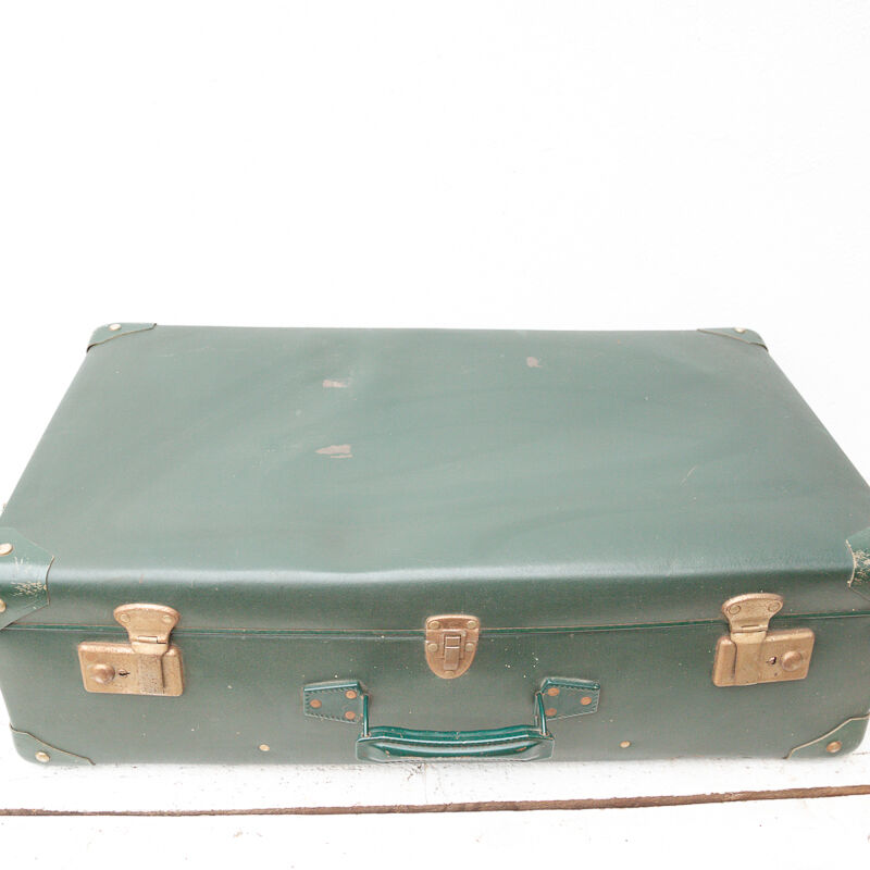 Green antique suitcase