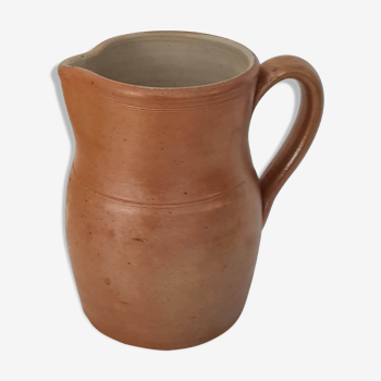 Crafted old terracotta milk pitcher