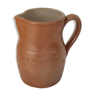 Crafted old terracotta milk pitcher