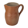 Crafted old terracotta milk pitcher