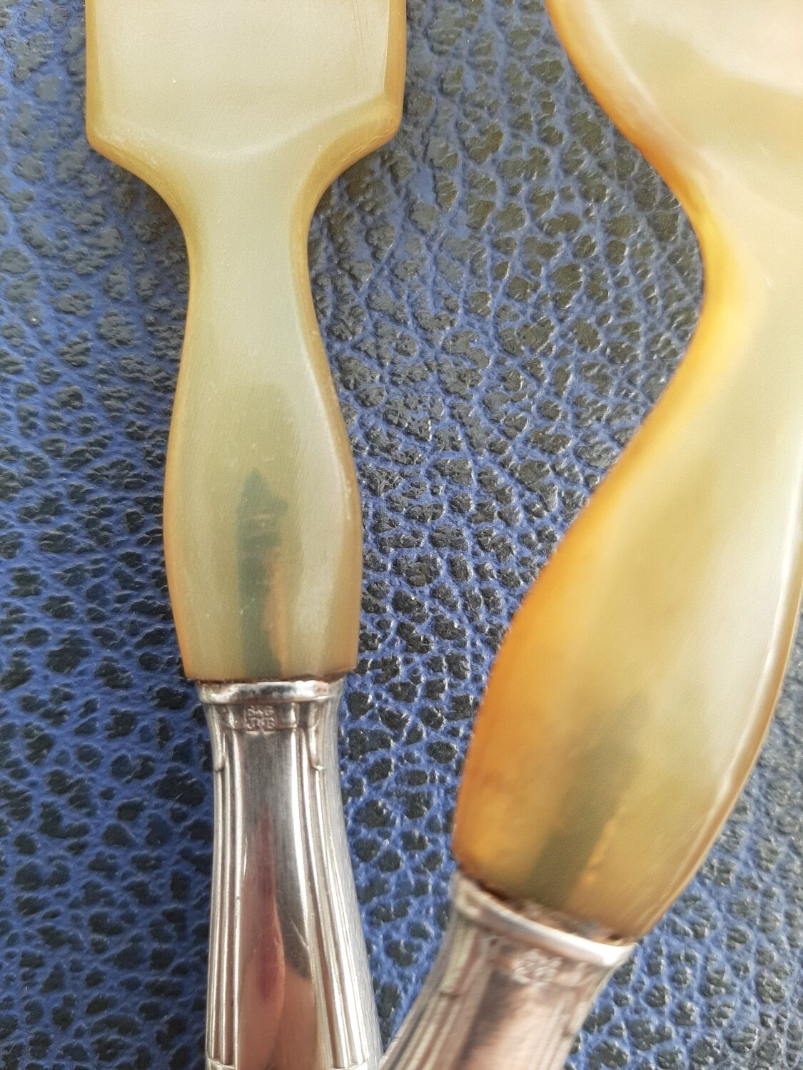 Corn and silver metal salad cutlery