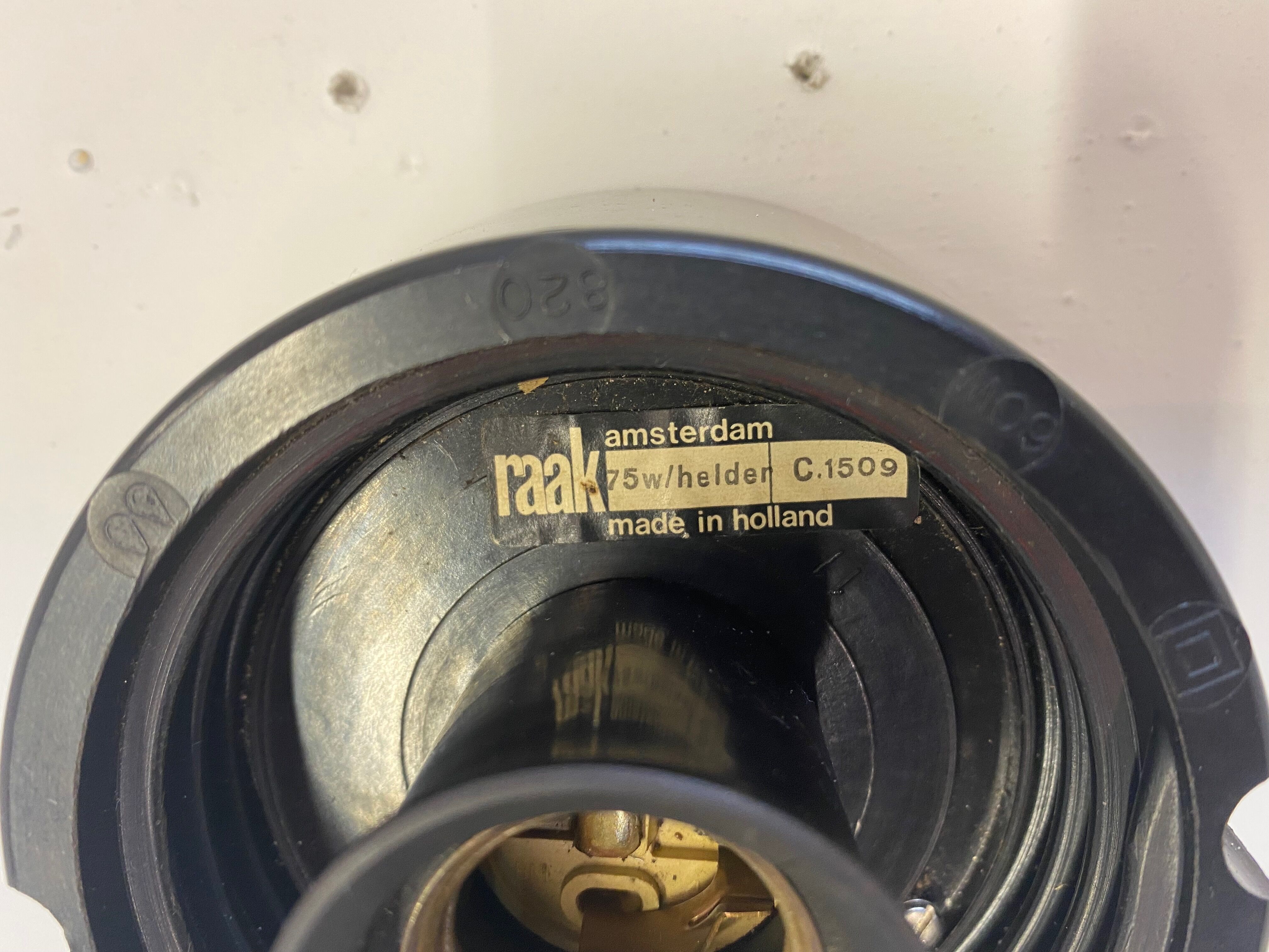 Vintage wall lamp by Raak design 1960