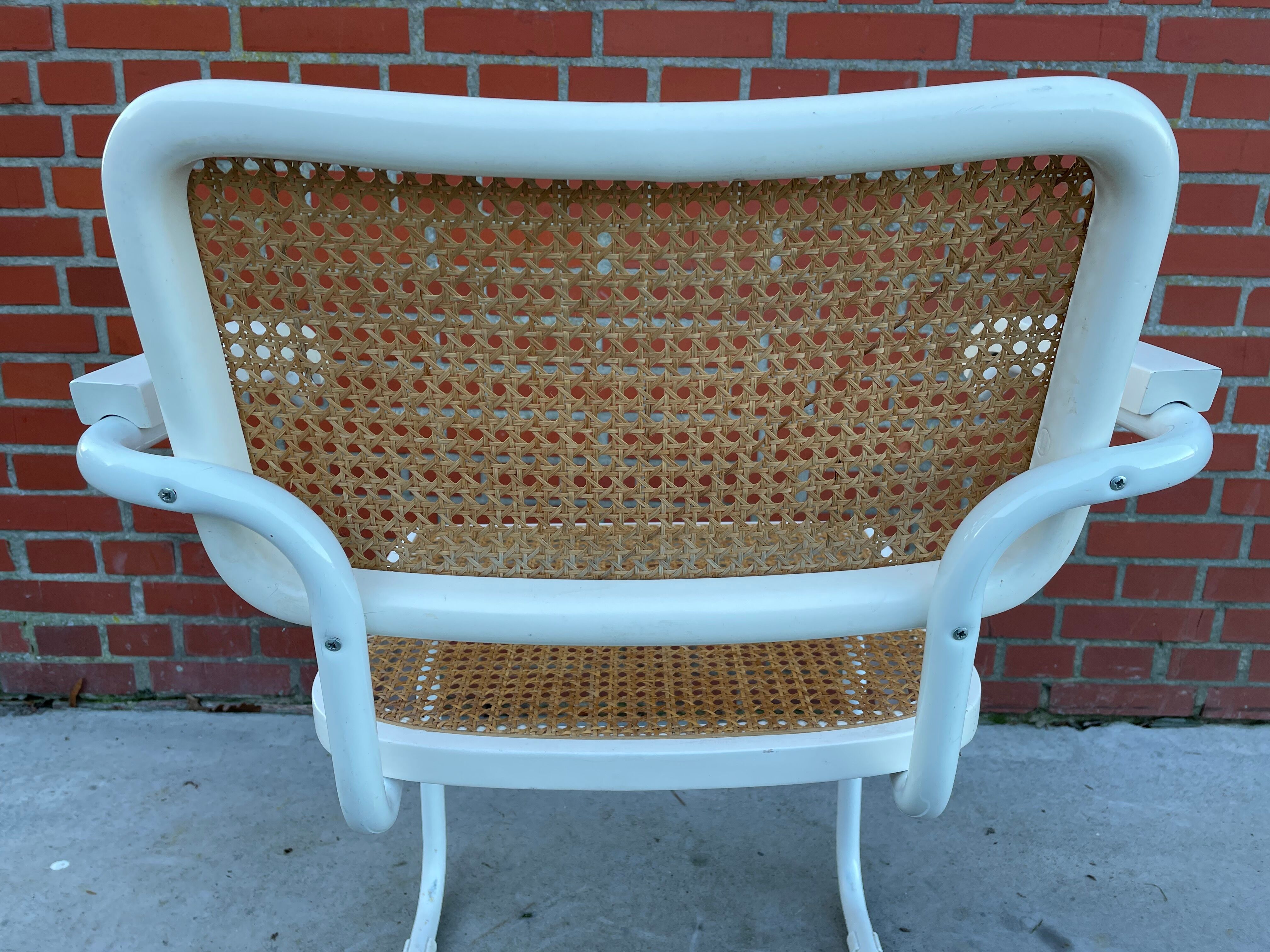 Cesca Chair model with armrest in white