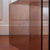 Vintage trio of nesting tables in smoked plexiglass by Michel Dumas, year.