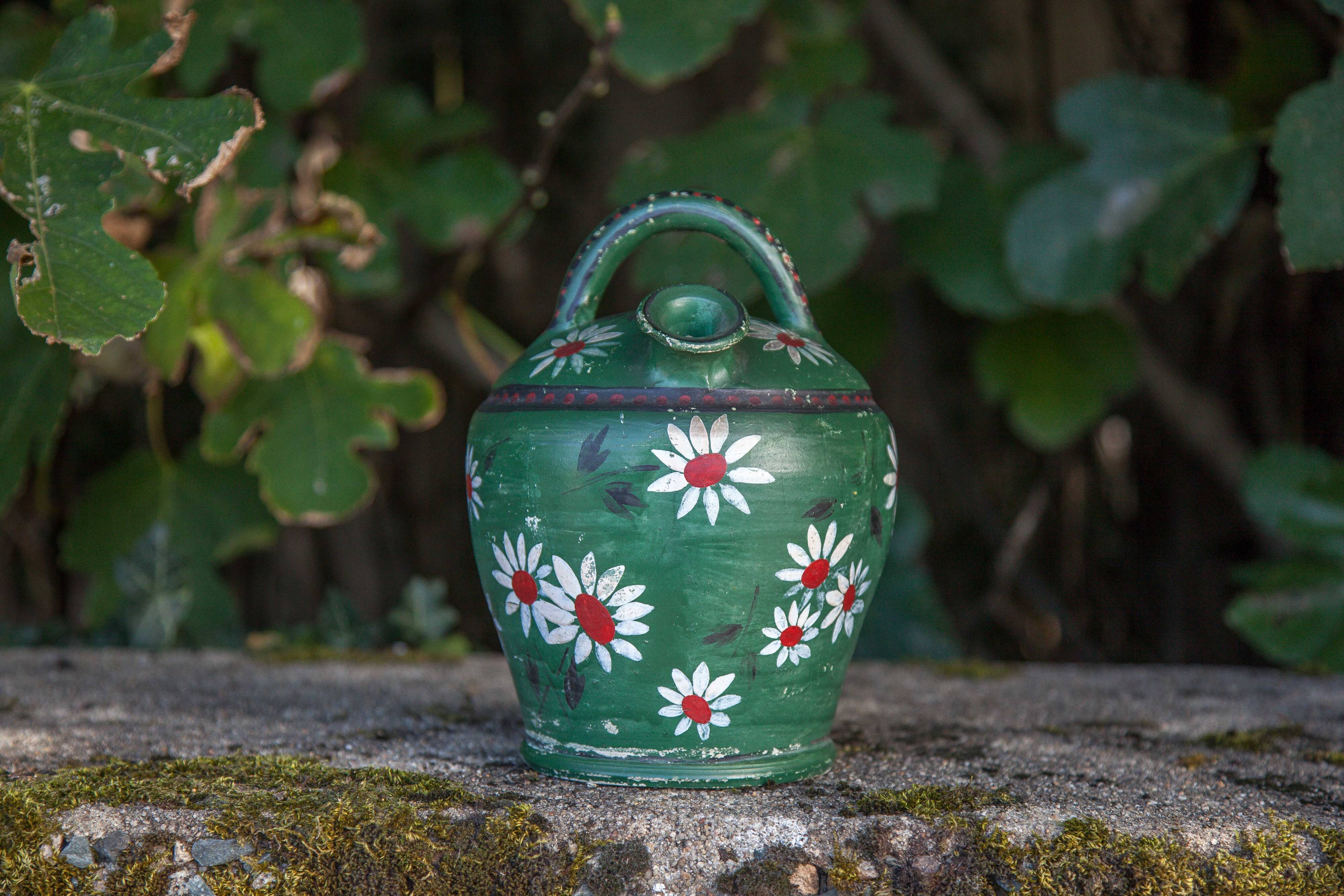Vintage gargoulette, jug, green painted pitcher with daisy patterns