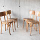 Suite de 4 chaises de bistrot Baumann 1950
