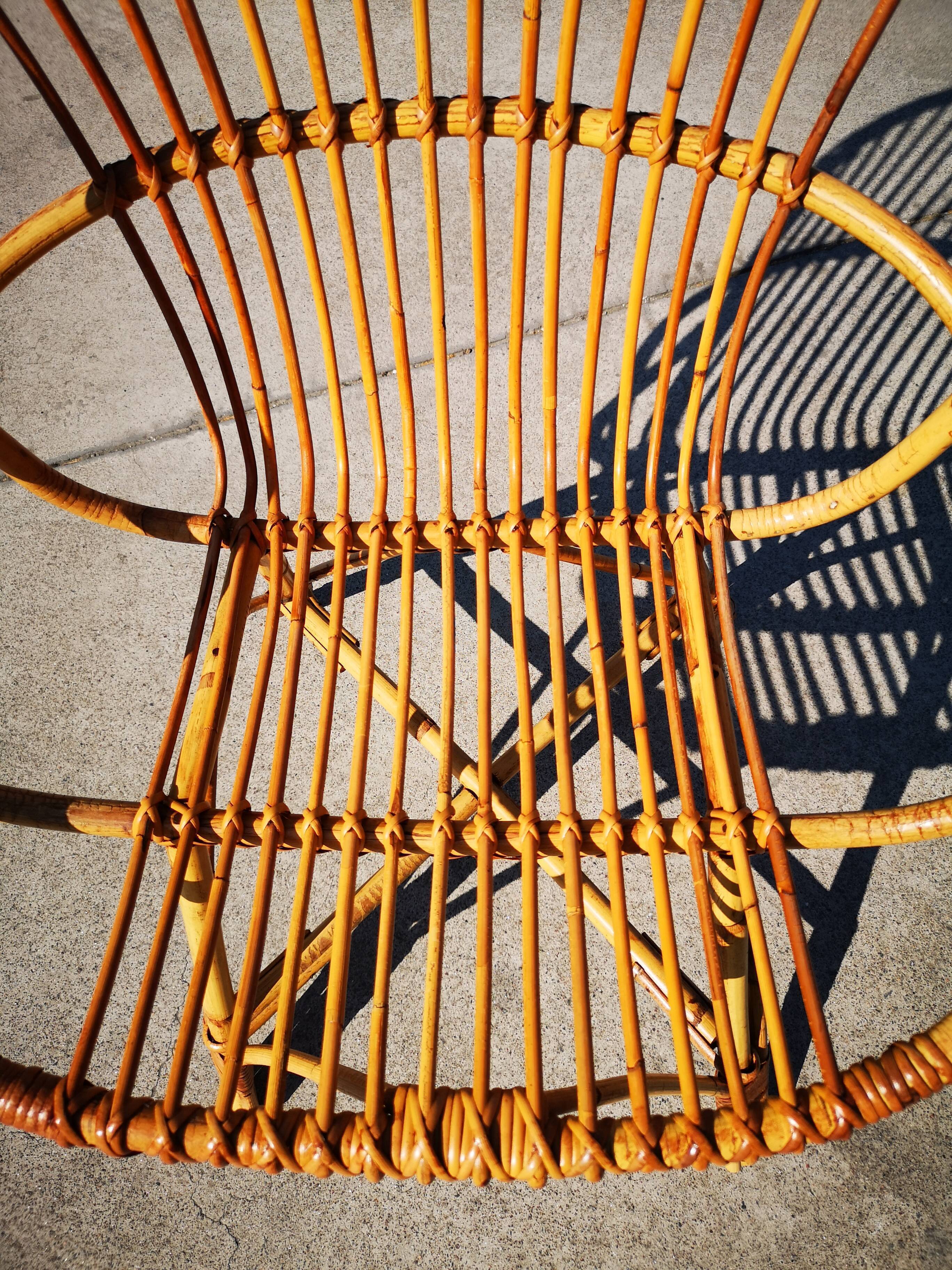 Four rattan chairs