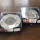 Paire de bougeoirs ronds en métal argenté design Danois