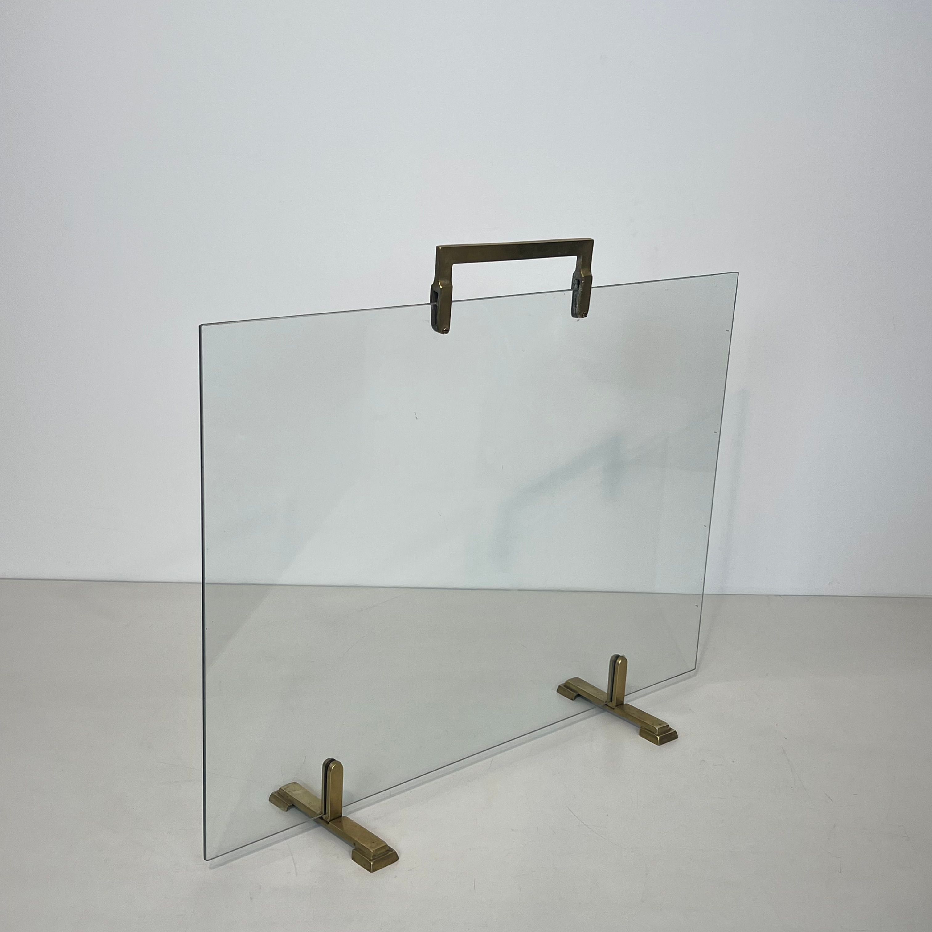 Glass and brass fire screen