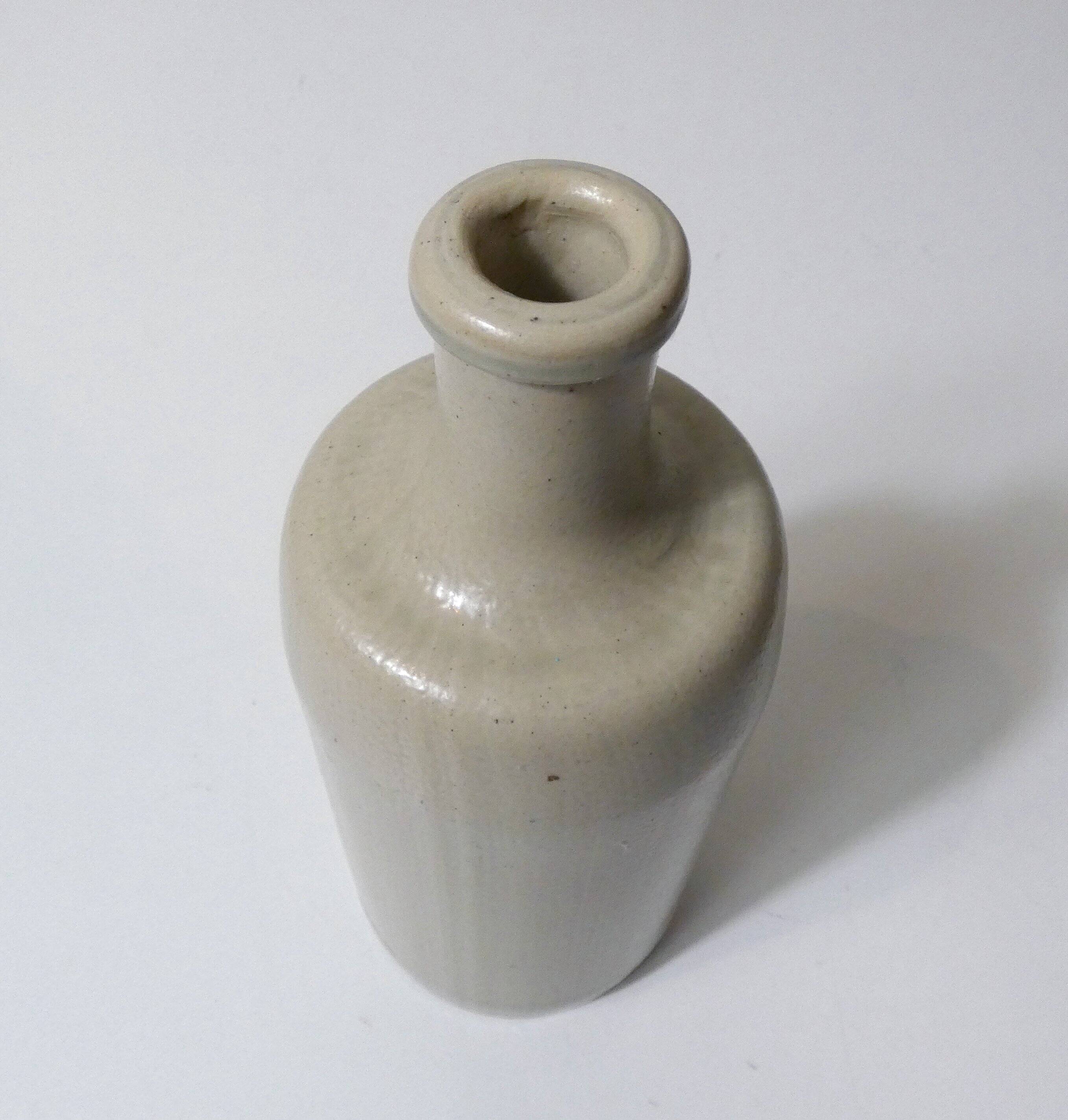 old beige stoneware bottle