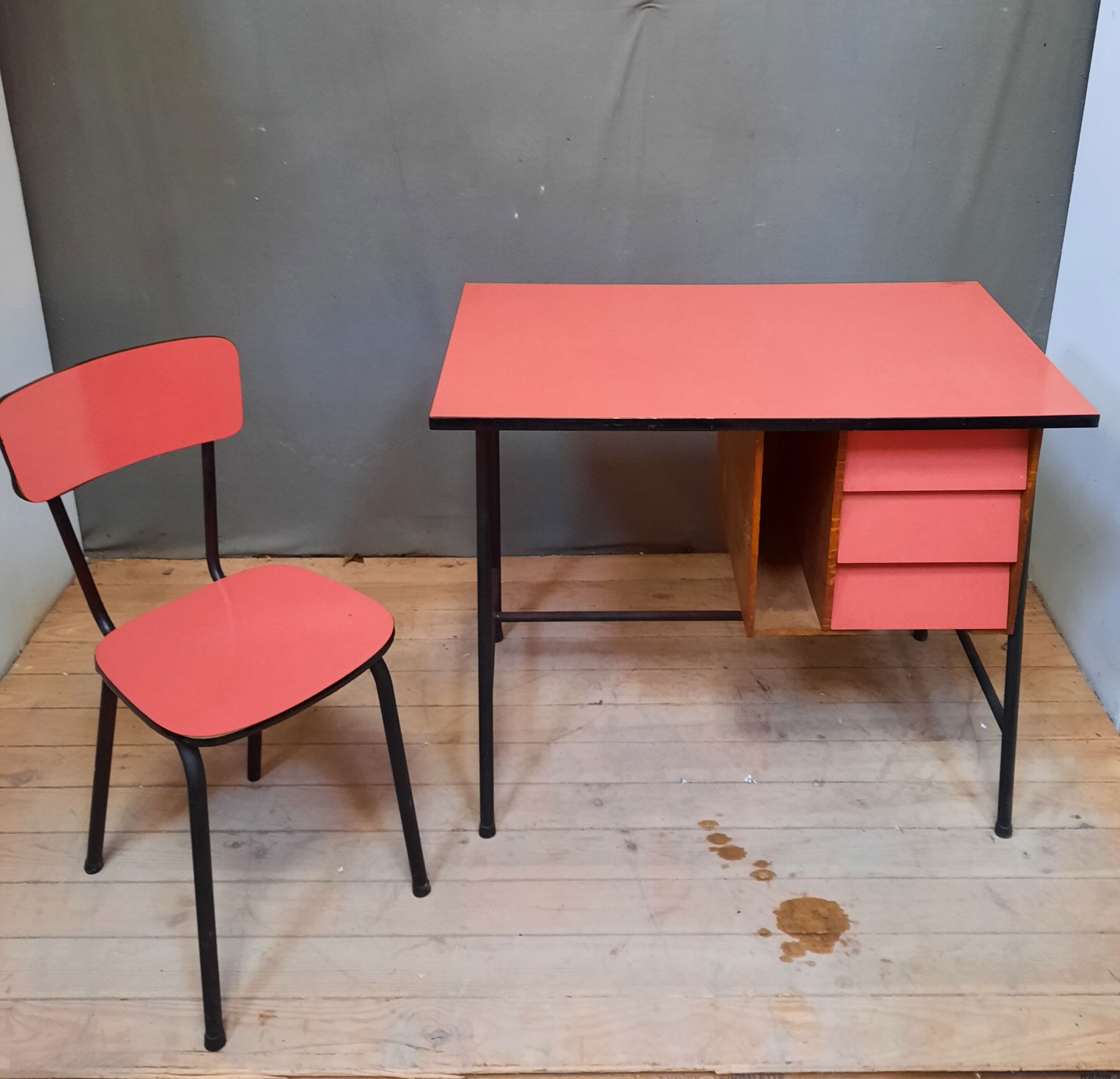 Red vintage desk and its chair