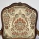 Louis XV style living room including a pair of armchairs and three chairs