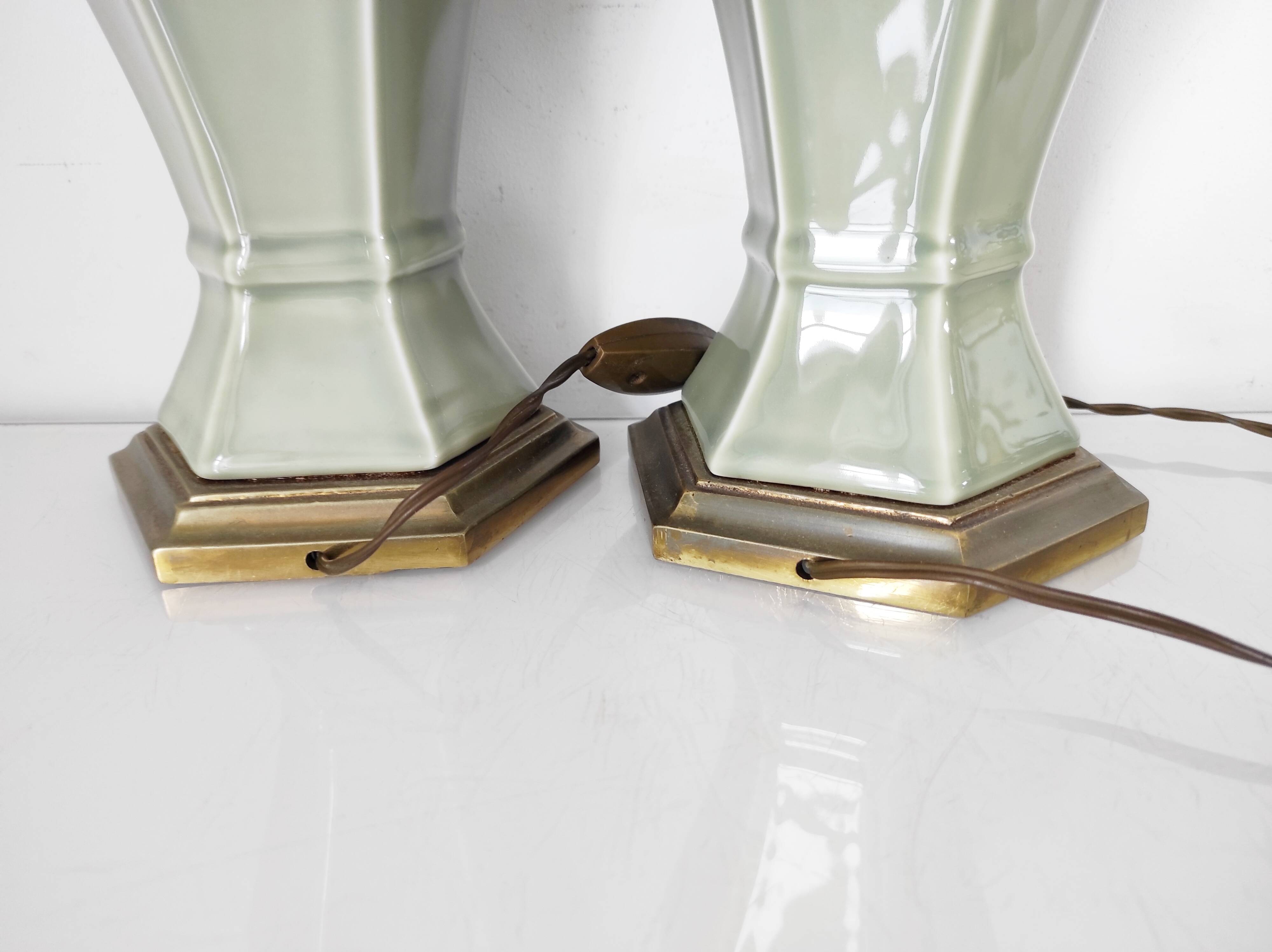 Two celadon-colored ceramic lamp bases