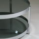 Round chrome-plated metal coffee table and smoked glass tops, France 1970s