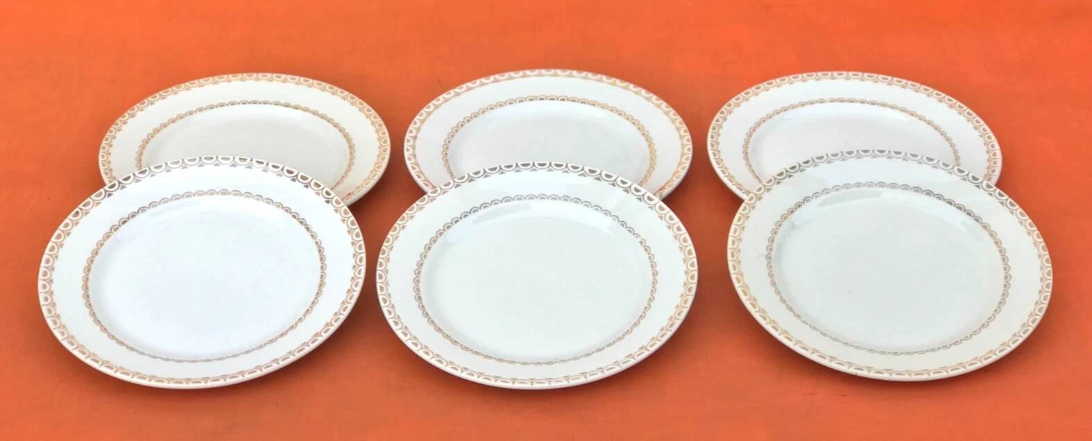 1950s set of 6 cheese/dessert plates, earthenware with gold frieze decoration.