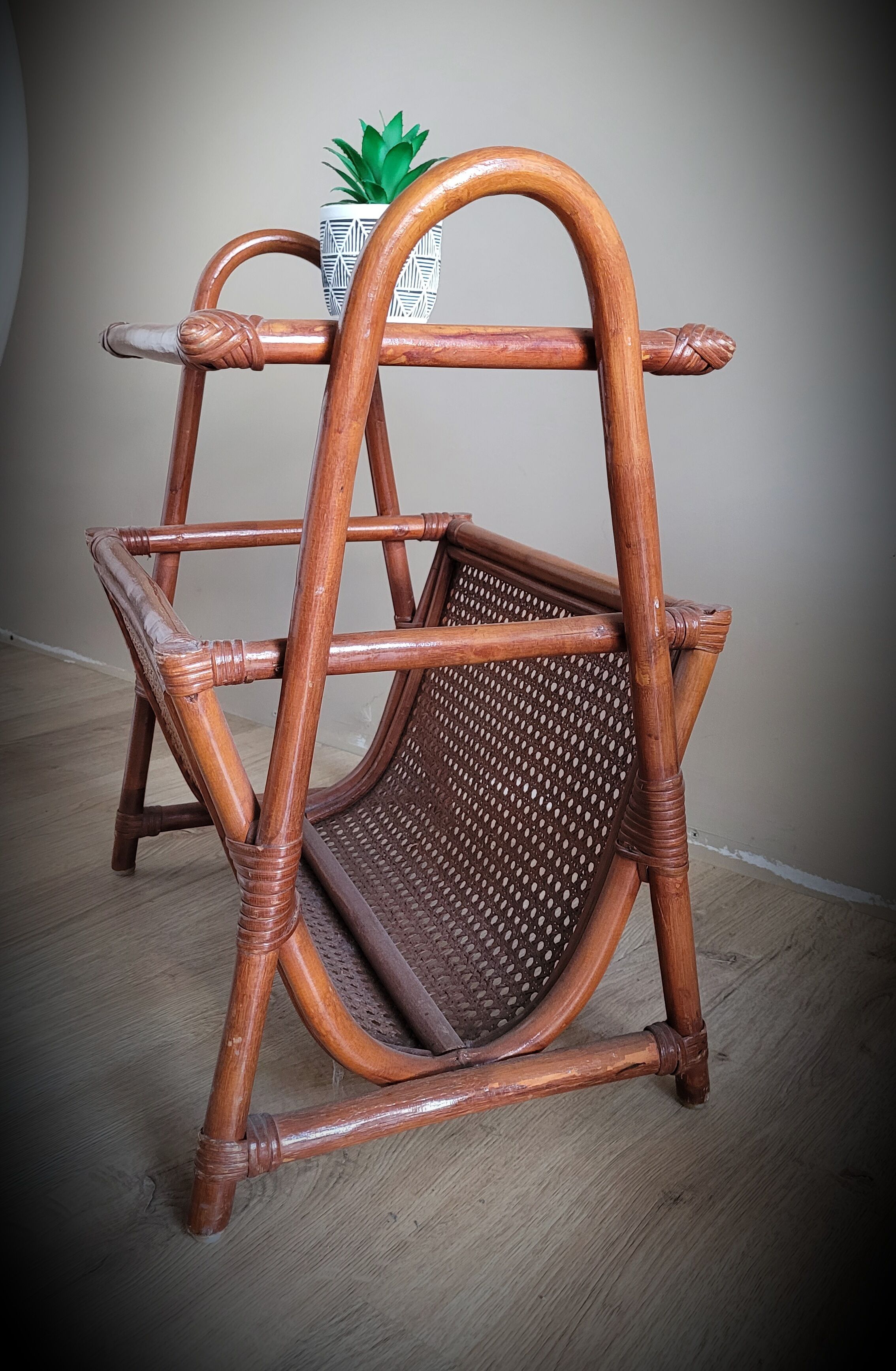 Braided rattan side table and smoked glass