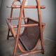 Braided rattan side table and smoked glass