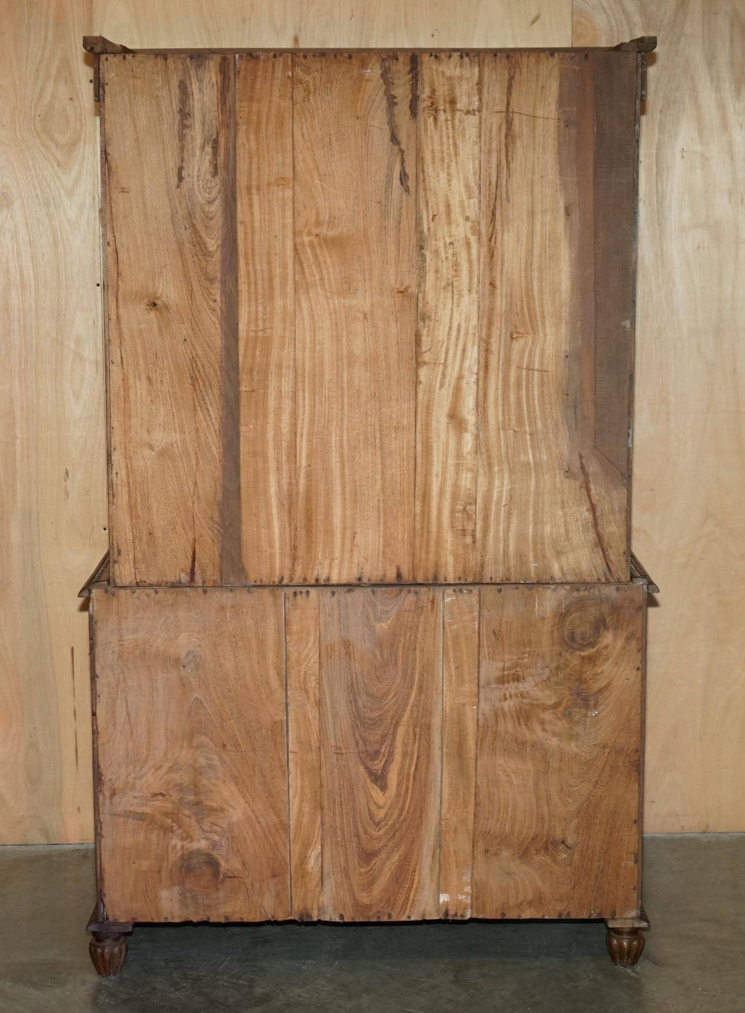 19th-century Anglo-Indian colonial hardwood library on a chest of drawers.