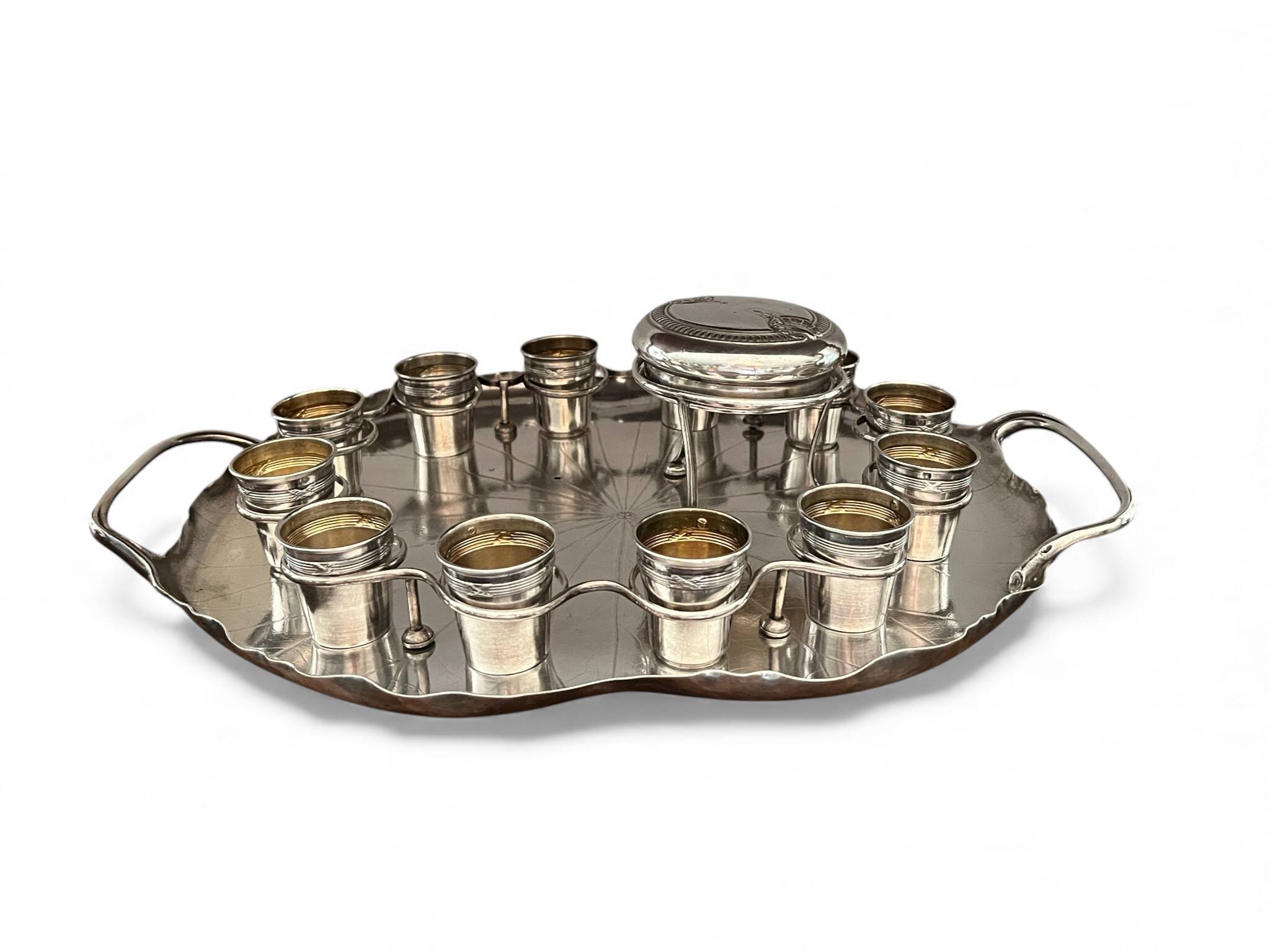 Silver-plated metal caviar service and 12 silver Minerva goblets, circa 1900