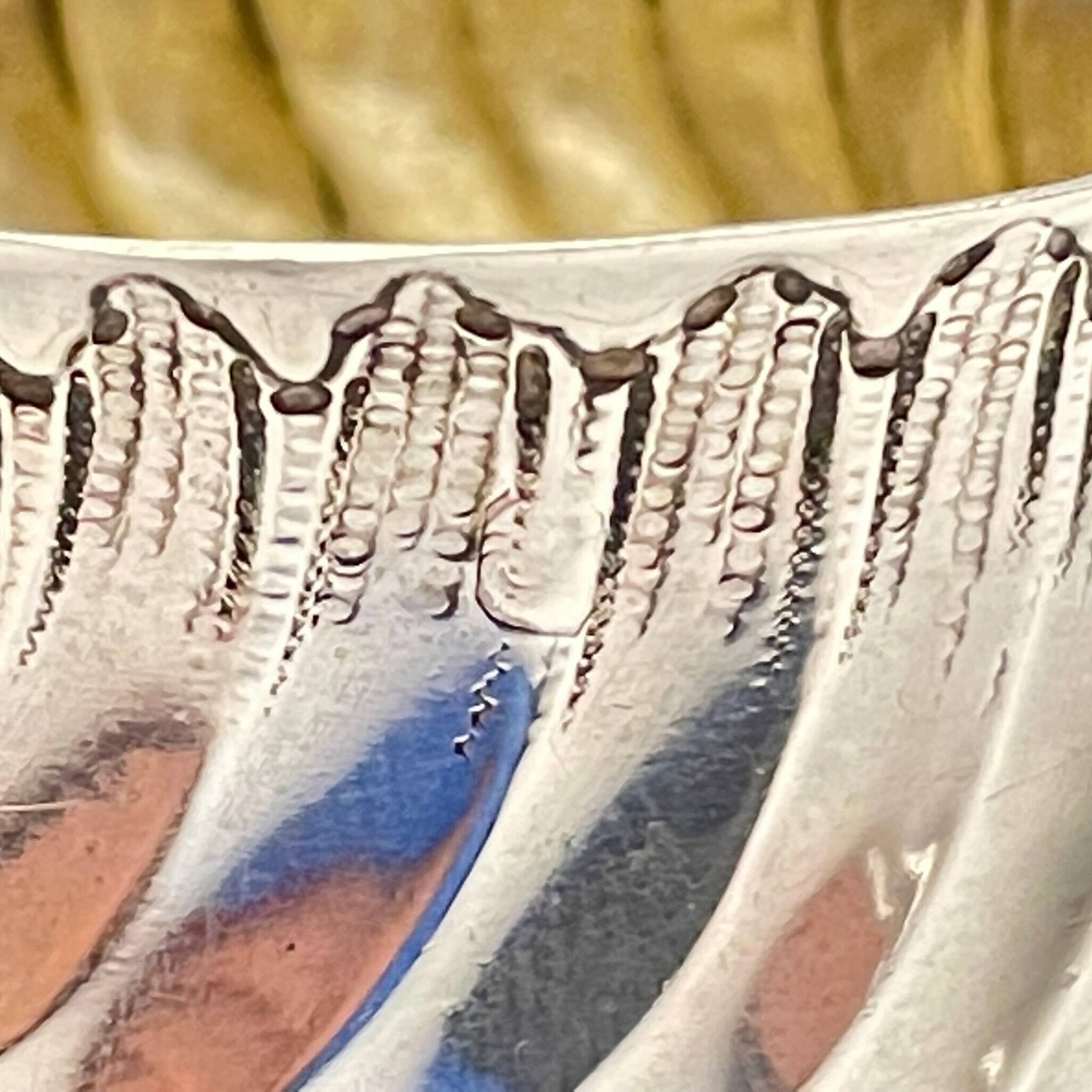 Pair of silver salt cellars and spoons