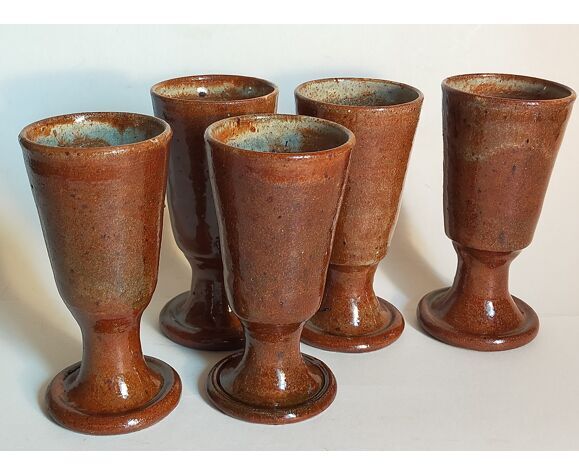 Five ancient potter's mazagrans in enamelled sandstone
