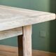 Farm table made of solid light oak wood.