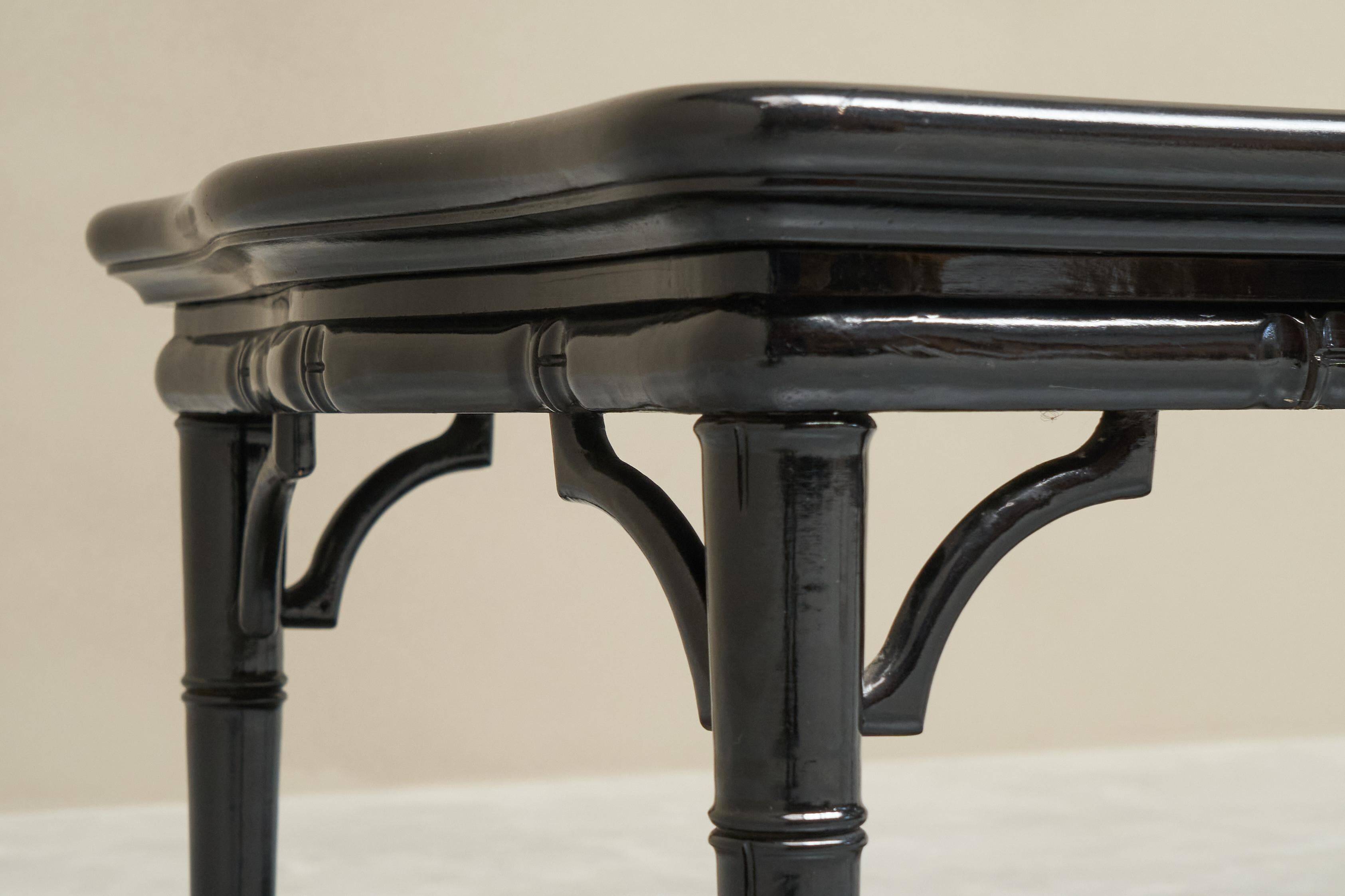 Coffee table in artificial bamboo, black lacquered wood and glass, 1960s.