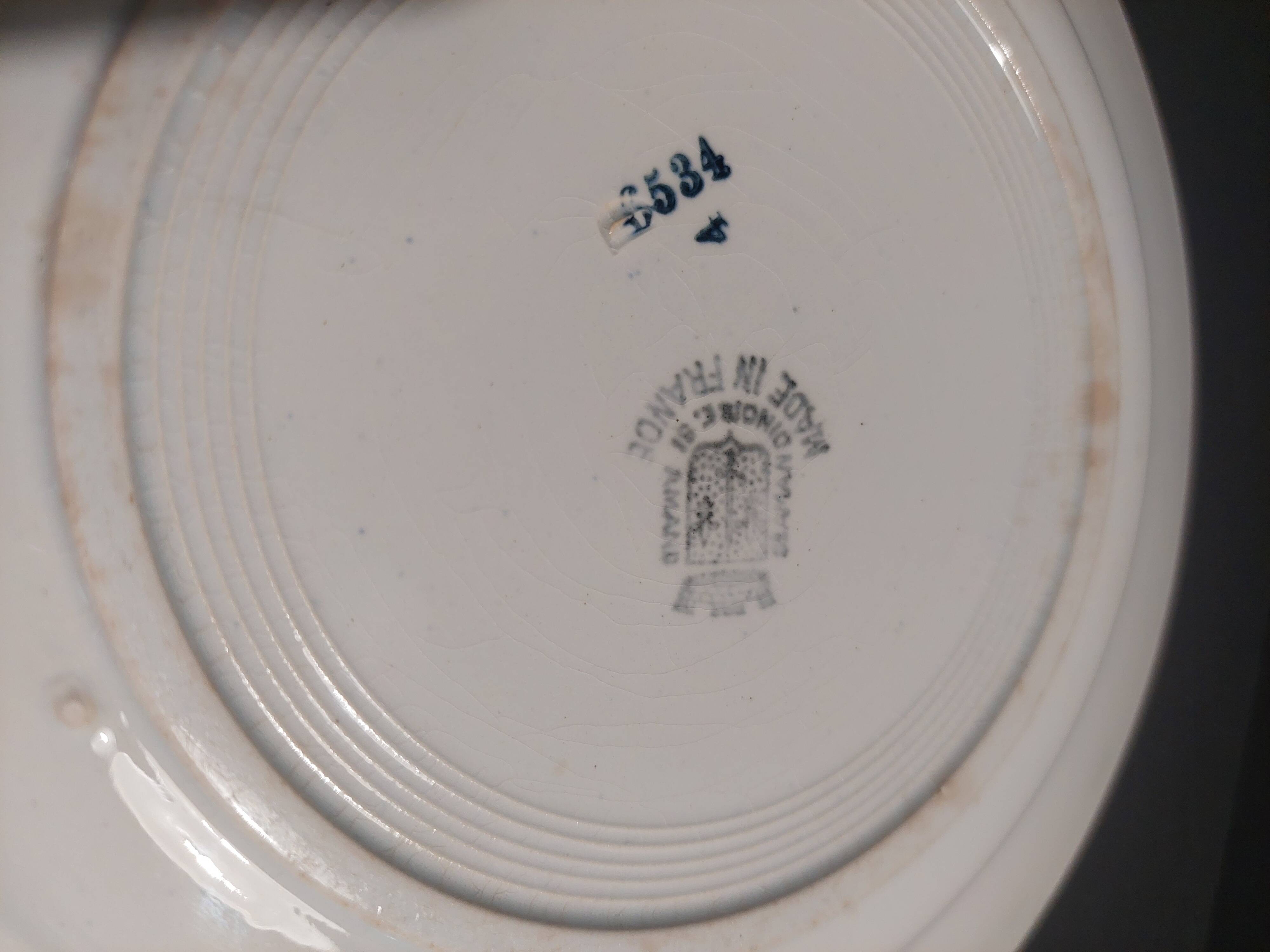 Pair of Saint Amand 20th century earthenware dinner plates