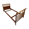 Wooden bed with brace