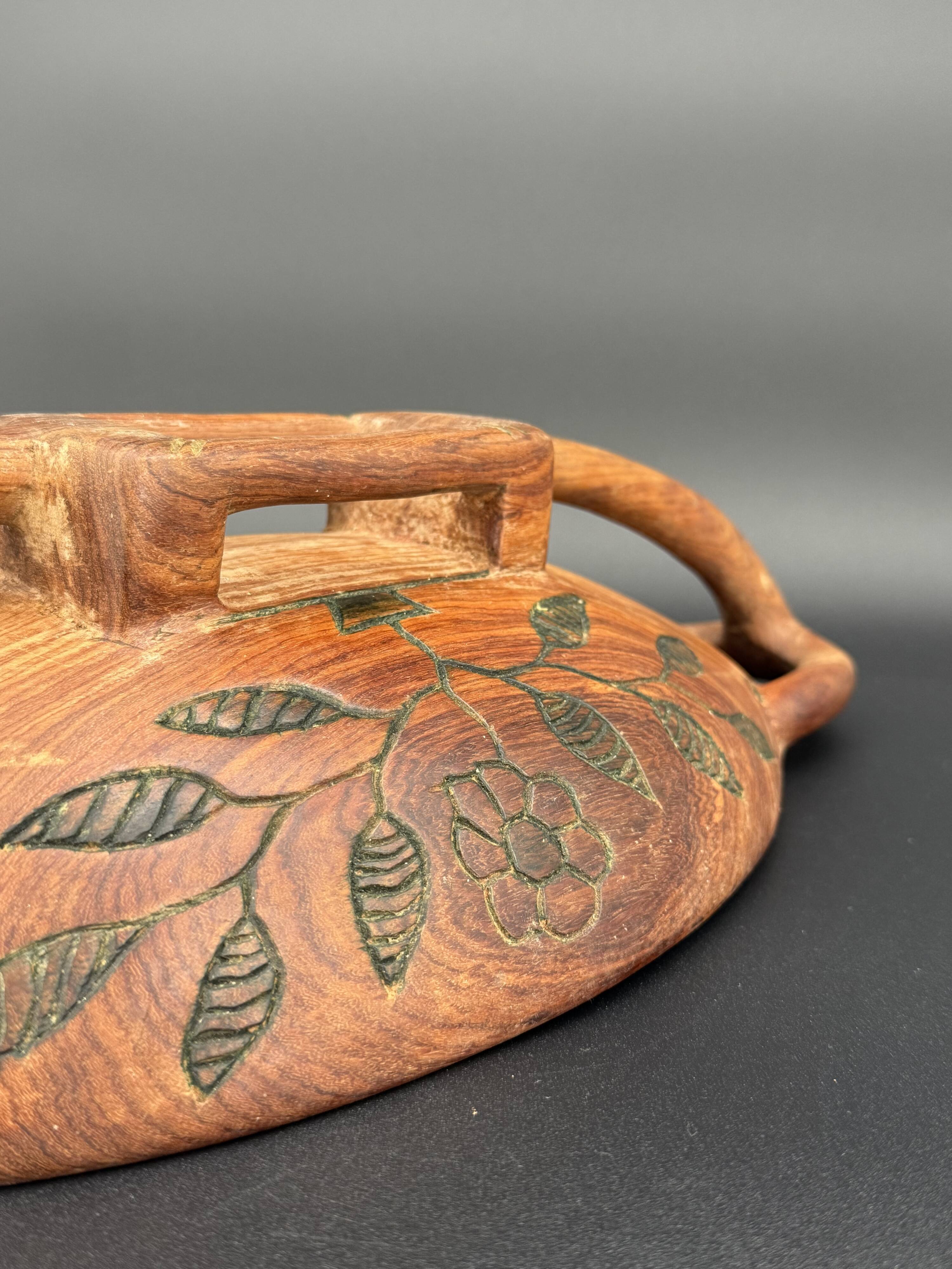 Carved cup in engraved wood – floral decoration and geometric handles
