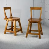 Pair of brutalist wooden back stools. France, circa 1960