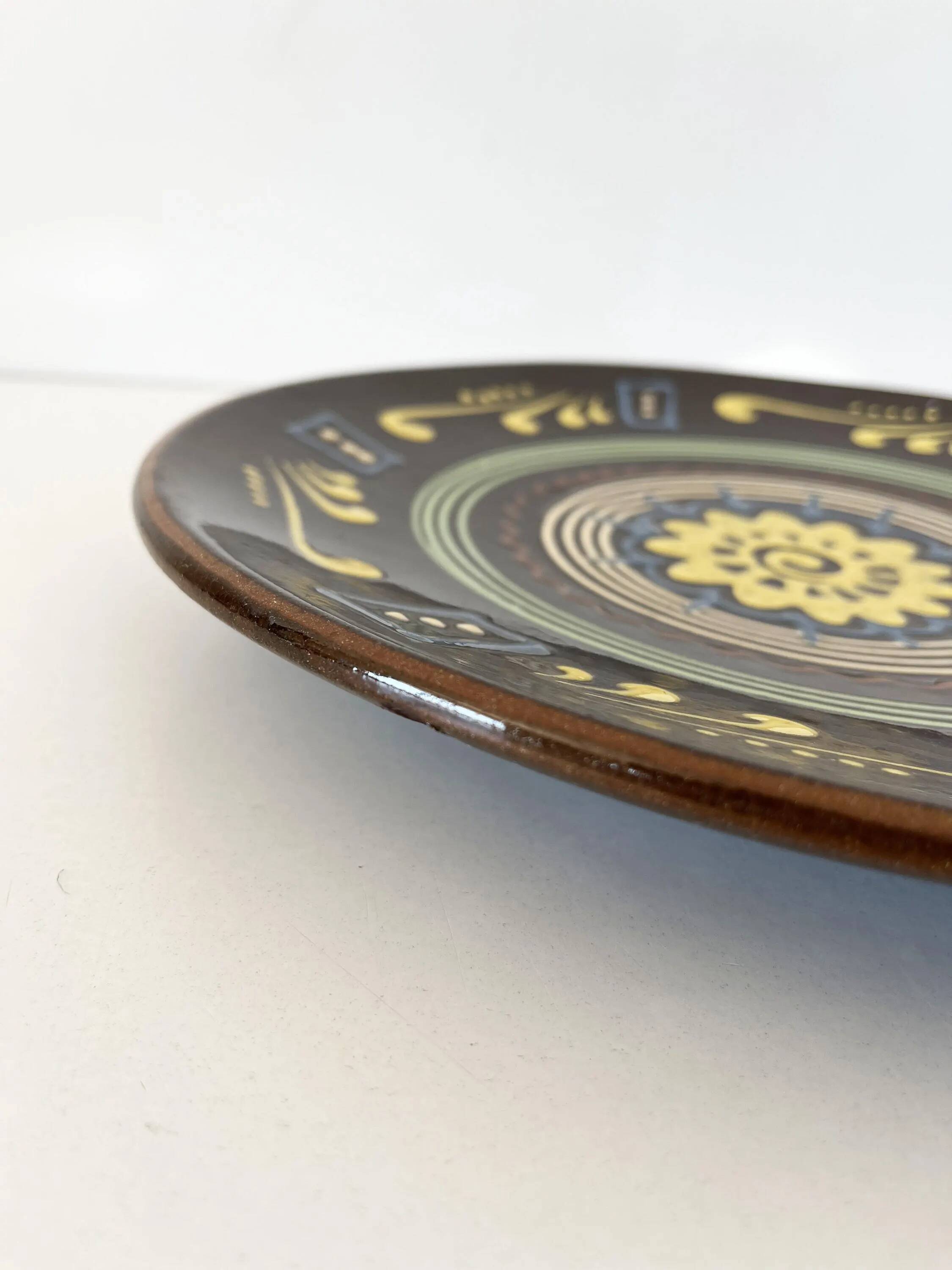 Large brown ceramic platter, 1960