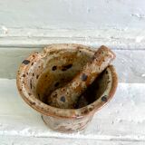 Pyrite sandstone mortar and its pestle