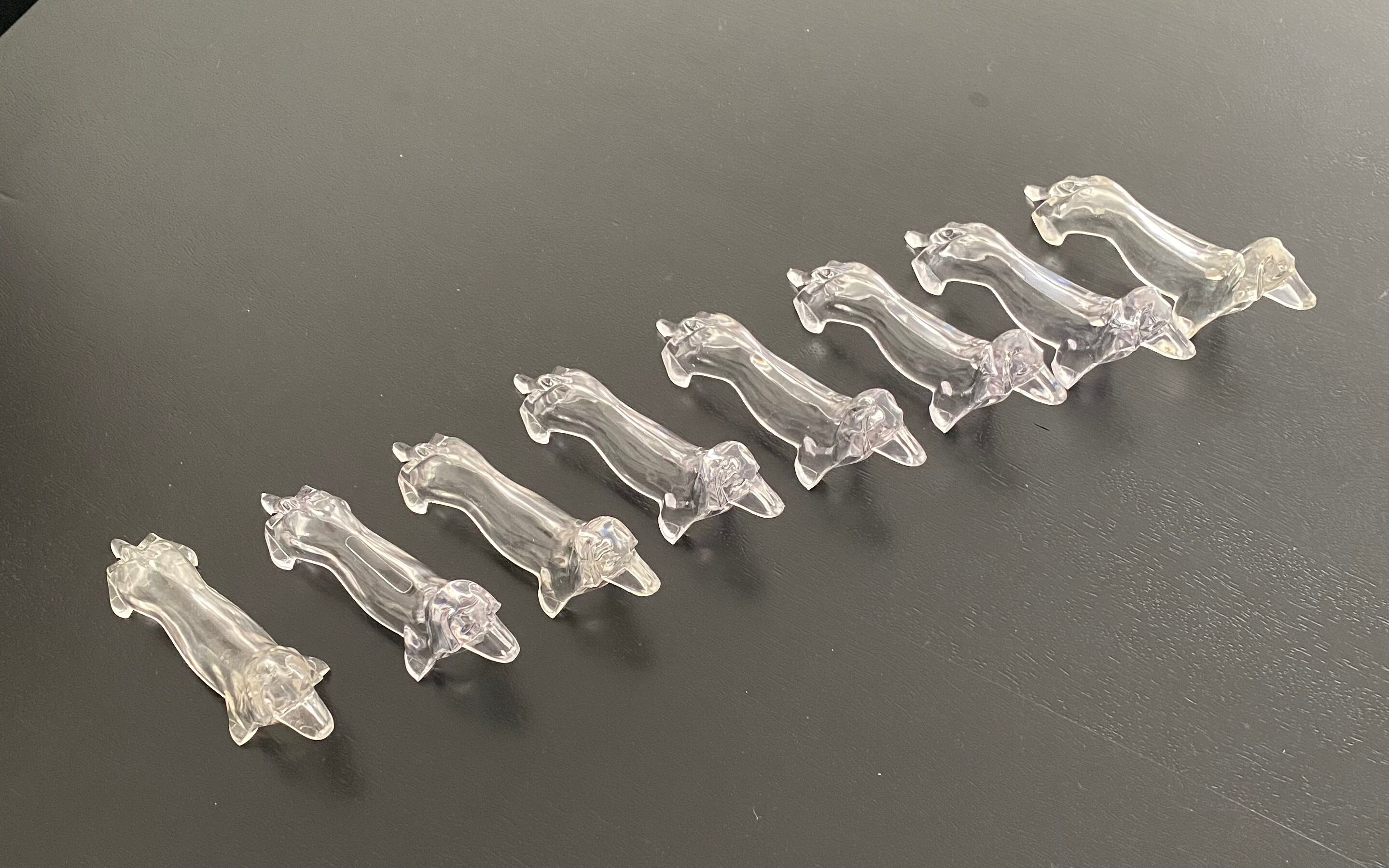 8 plastic knife holders, 70s, dachshund shape
