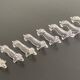 8 porte-couteaux en plastique, années 70, forme teckel