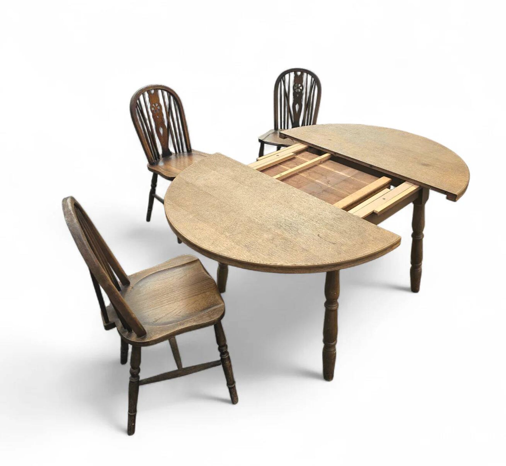 A slightly weathered Windsor wheelback dining set (7) by Oirschotse Meubelindustrie 1950s