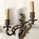 Pair of bronze wall sconces in Louis XV style